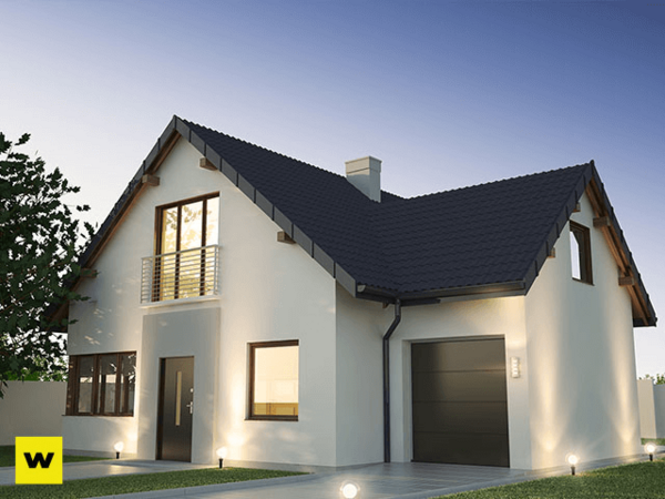 Modernes Einfamilienhaus mit Satteldach, Garage und gepflegtem Garten bei Sonnenuntergang.